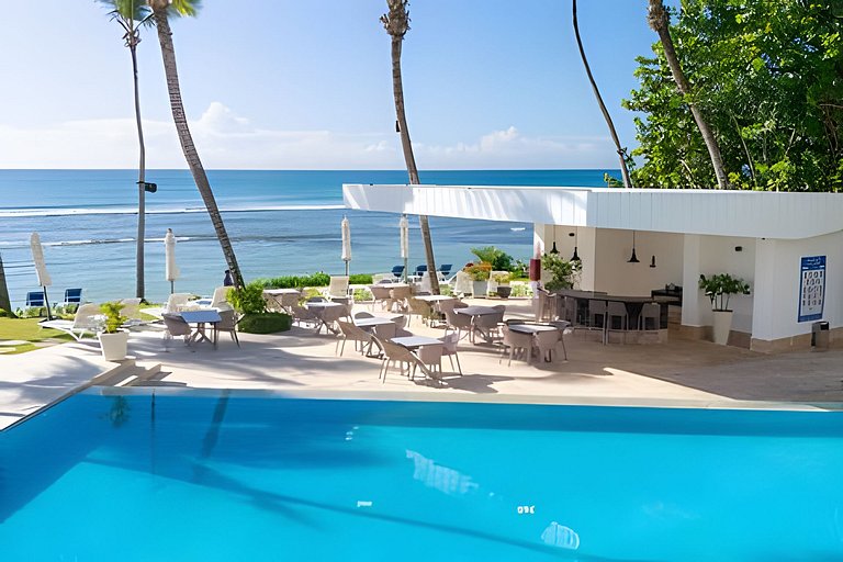 Caribbean Golden Sunset View,1BDRM Beachfront Apt.
